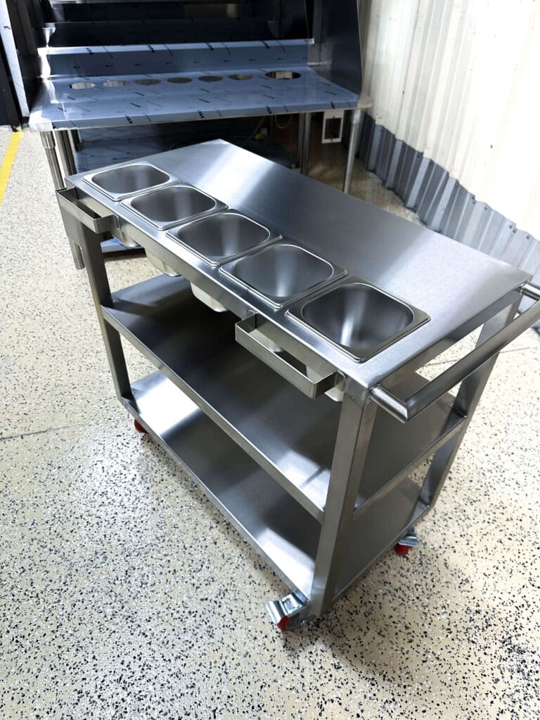 newly manufactured stainless steel kitchen cart with wheels